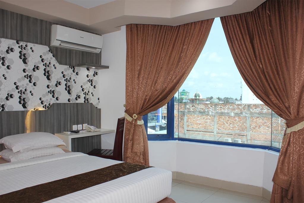 Grand Hotel Джамби Экстерьер фото